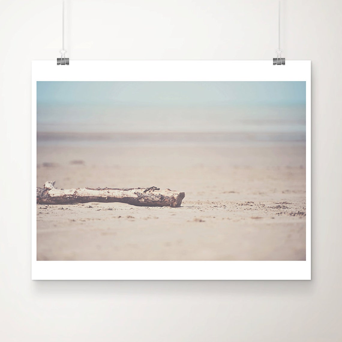 Pastel Driftwood on Sandy Beach Soft Coastal Photo Wall Poster