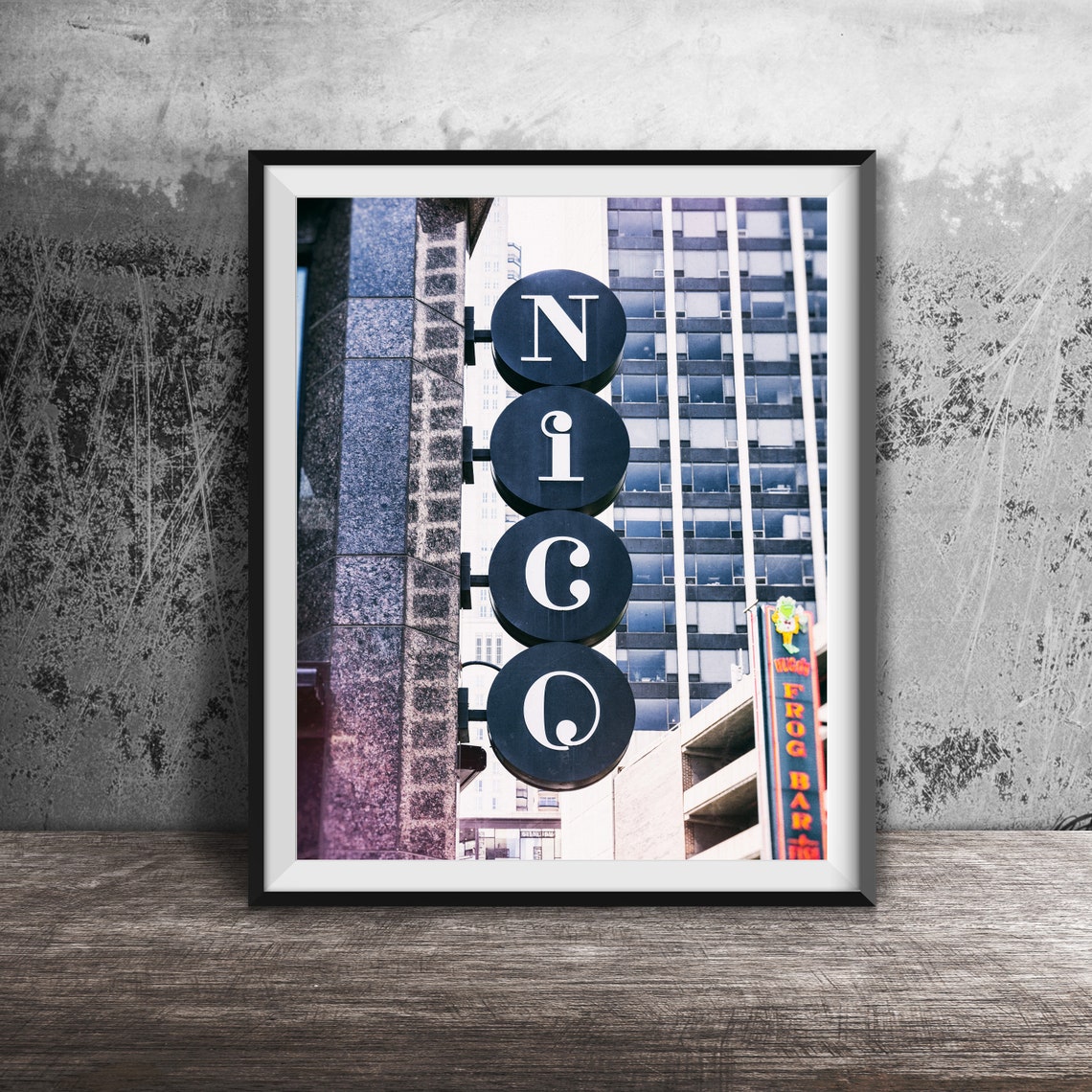 Nico Stacked Letter Vertical Blade Sign Against Downtown Towers Poster