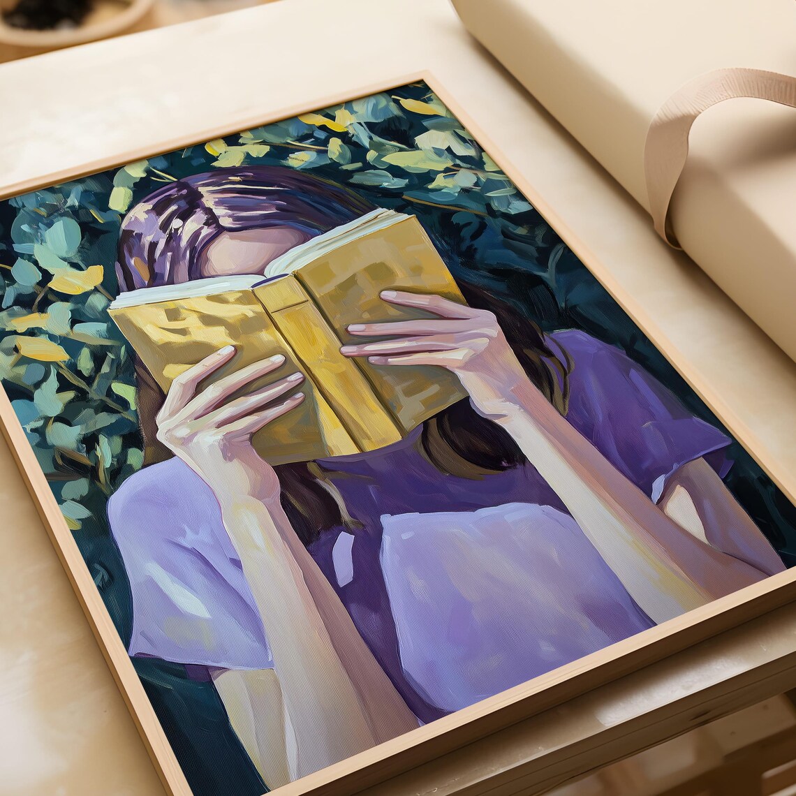 Woman Reading with Book Covering Her Face Among Green Foliage Poster - Image 7