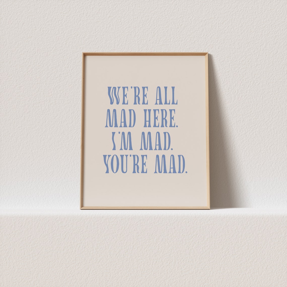 We Are All Mad Here Alice Quote Poster in Dusty Blue Vintage Serif