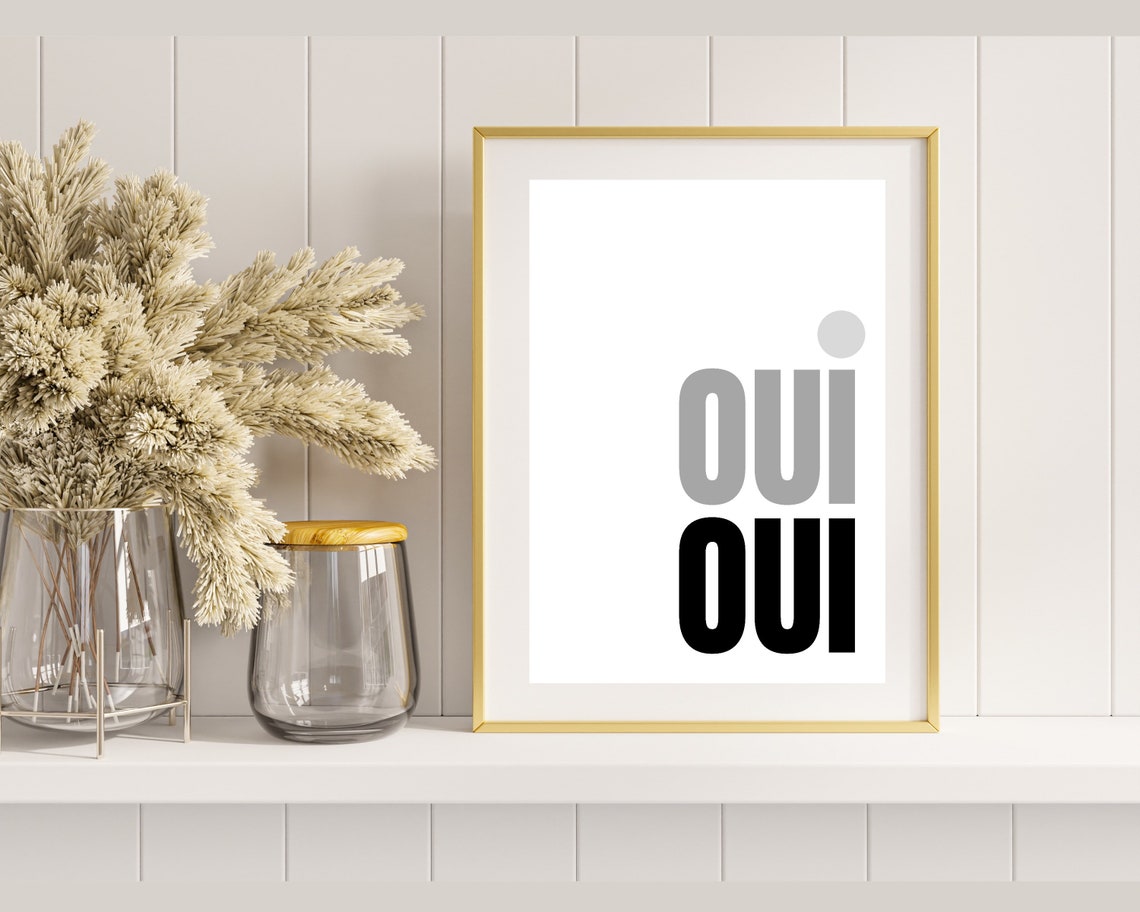 Oui Oui Typography Poster In Light Grey And Black On A White Wall - Image 3