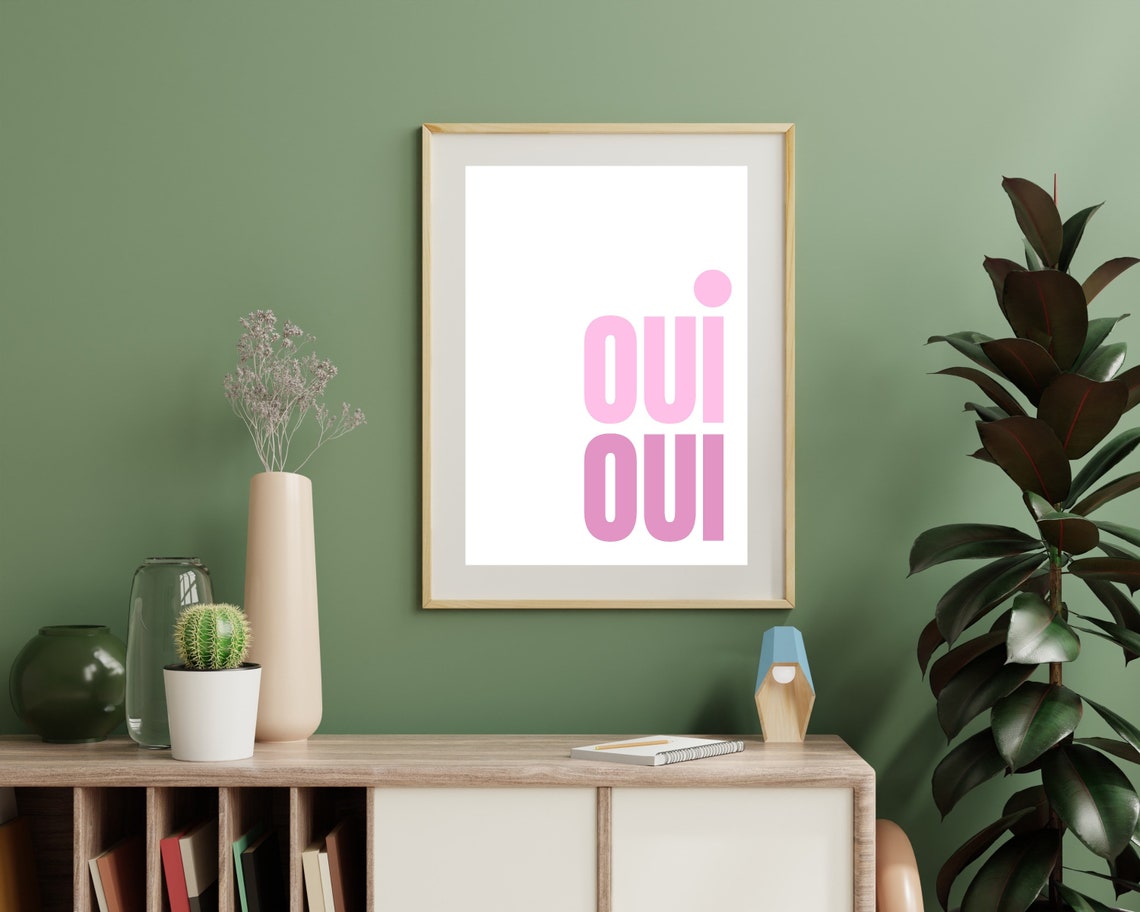 Oui Oui Typography Poster In Light And Deep Pink On A White Wall - Image 2
