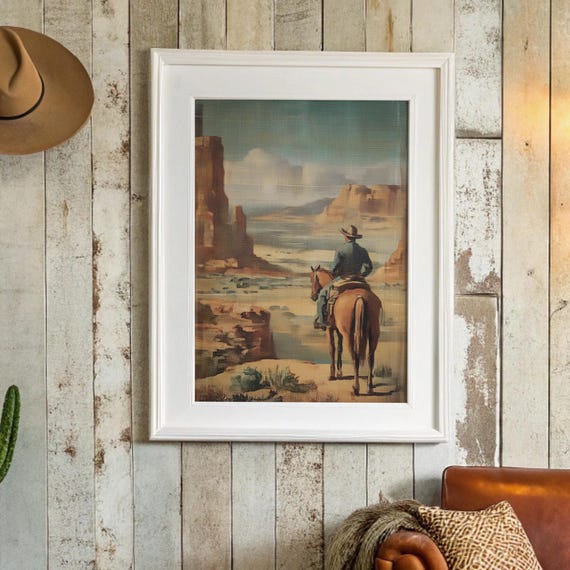 Cowboy Overlooks Desert Canyon