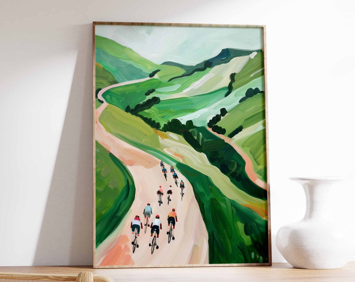 Cycling Peloton on Winding Road Through Green Rolling Hills Poster