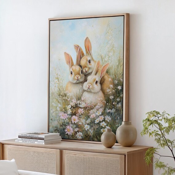 Three Baby Rabbits Huddled Together in Blooming Wildflowers Poster