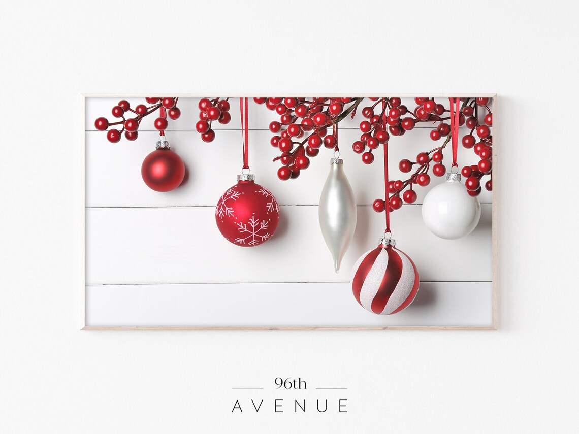 Red and White Christmas Baubles Hanging from Berry Branches Poster
