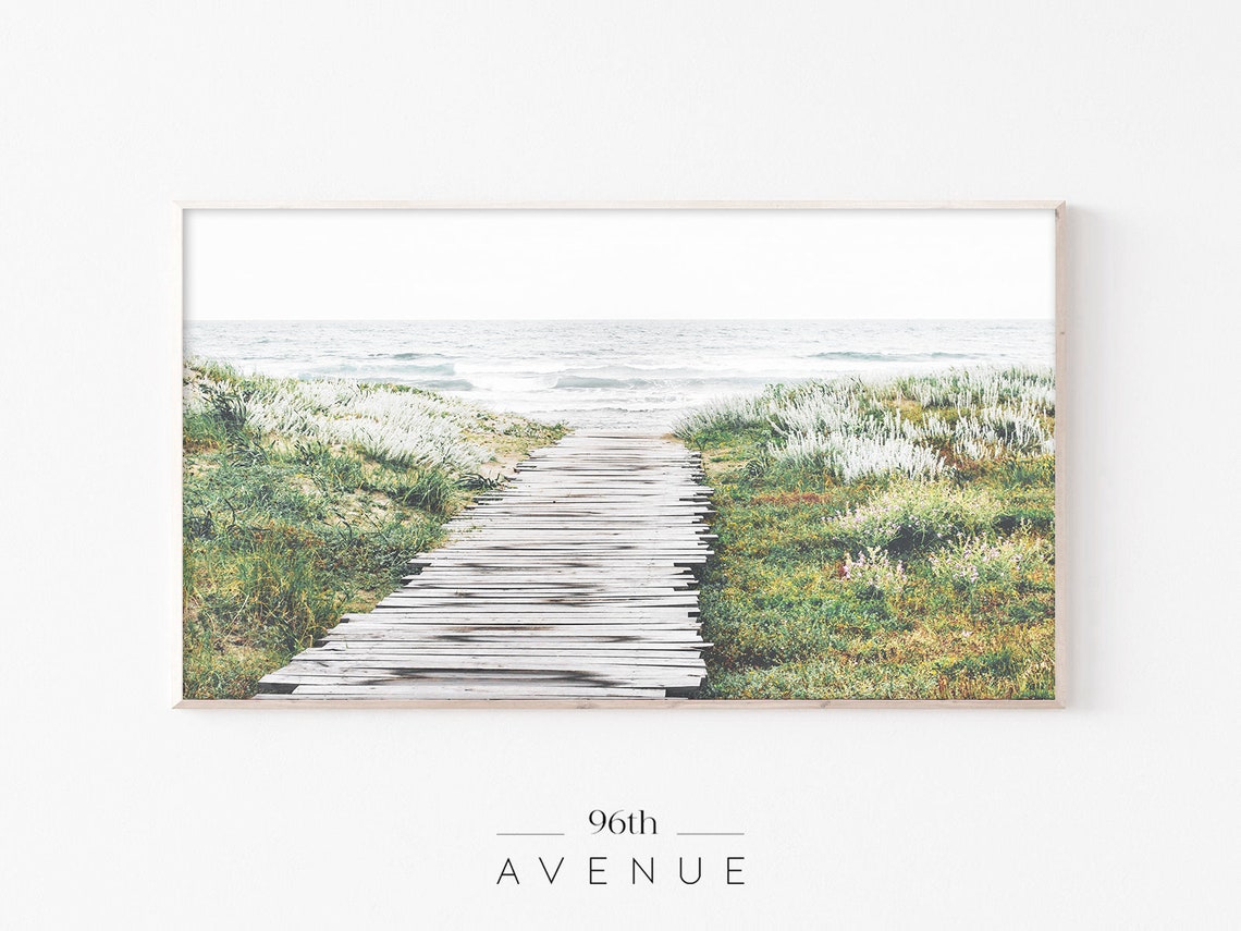 Wooden Boardwalk Path Through Dunes To Quiet Shoreline Print