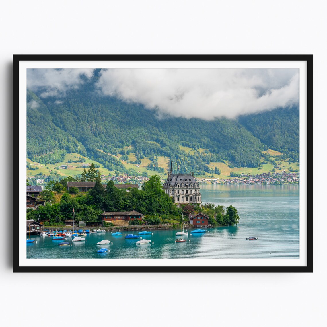 Historic Lakeside Chateau with Sailboats Under Green Mountains Poster