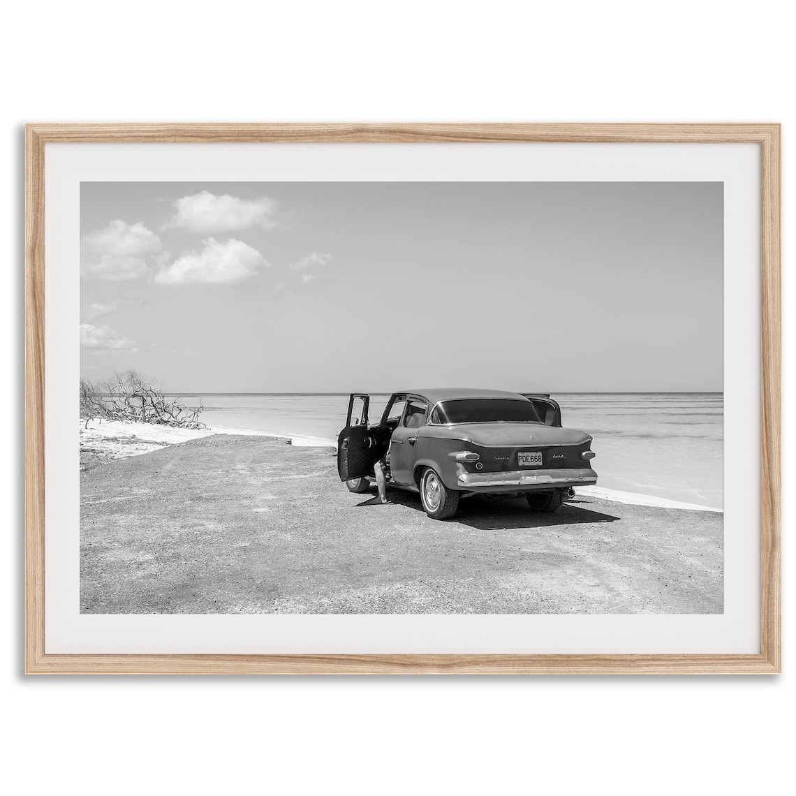 Black And White Vintage 1950s Classic Car Parked On Ocean Beach Poster