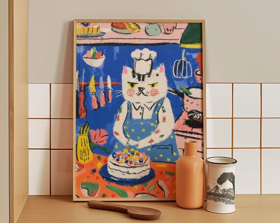 White Chef Cat Decorating a Candy Topped Cake in Blue Kitchen Poster