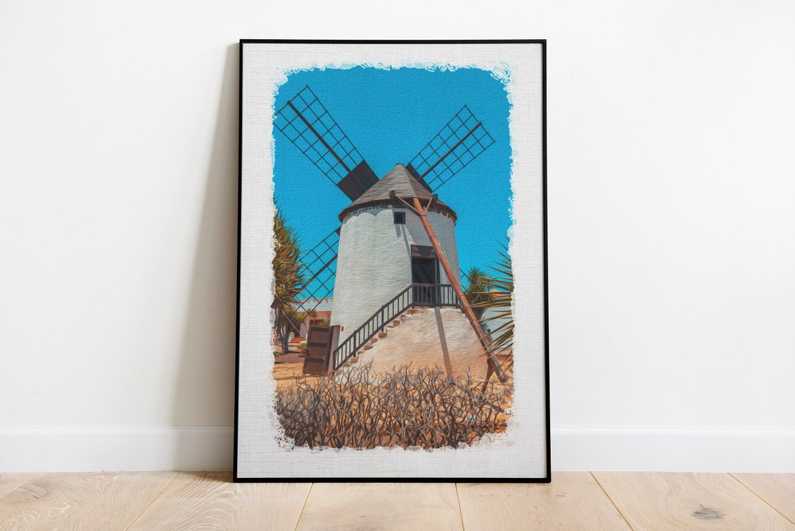 Rustic Mediterranean Windmill Against Bright Blue Sky Poster