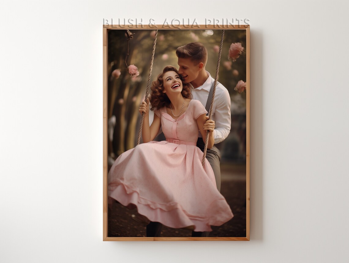 Vintage Couple Laughing on a Swing in a Pink Blossom Garden Poster
