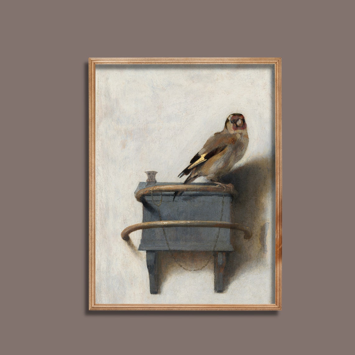 Chained Goldfinch Perched Atop a Small Wall-Mounted Feeder Poster - Image 3