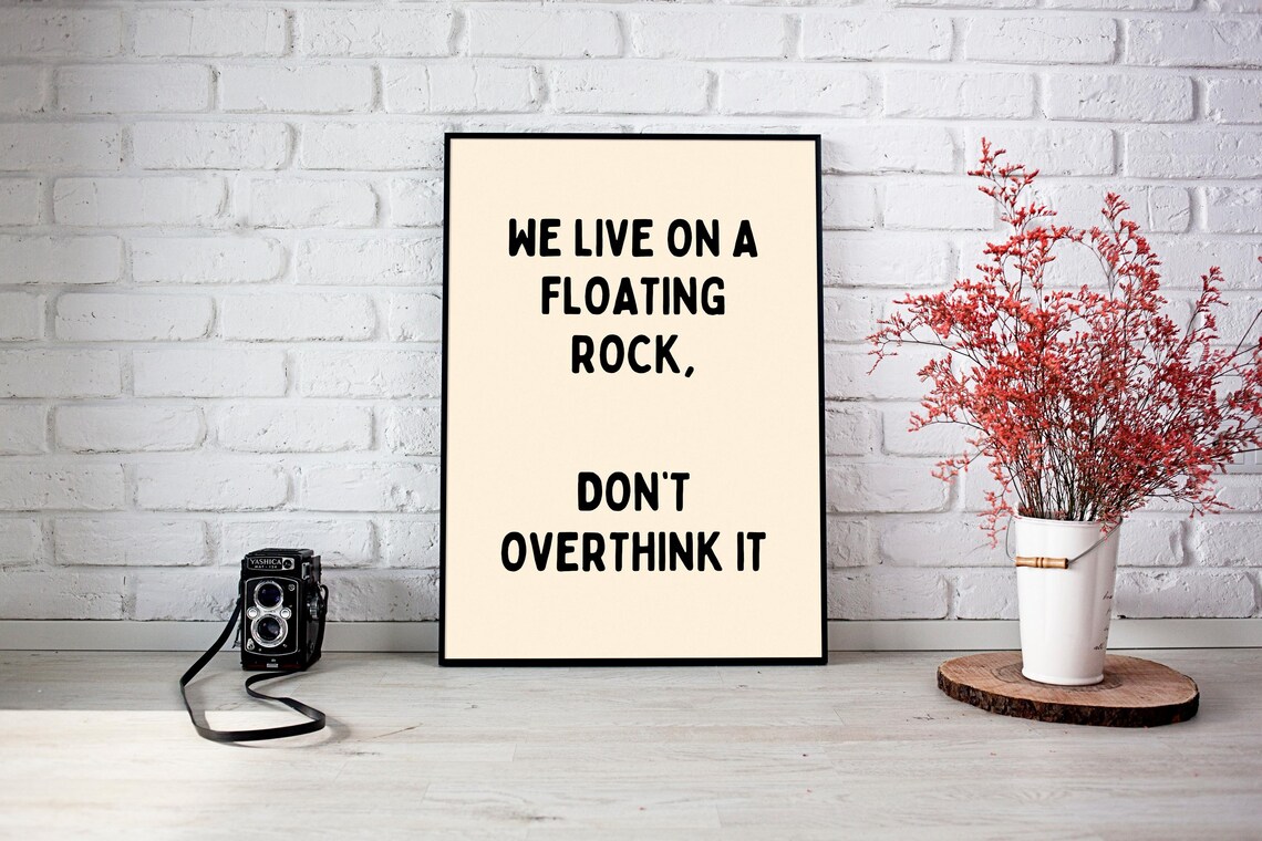 We Live on a Floating Rock Quote Art Print