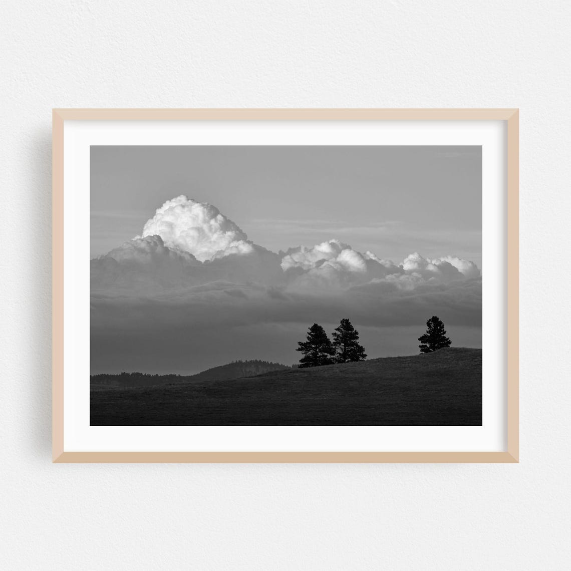 Black and White Clouds Over Rolling Prairie Hill Photography Poster