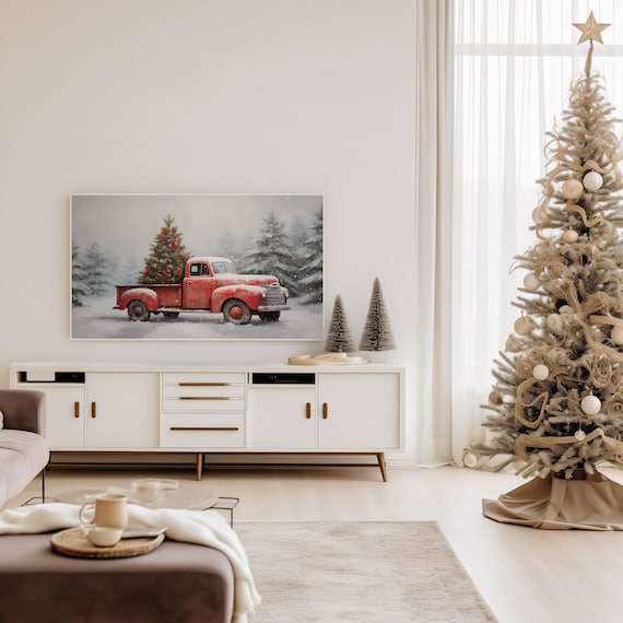 Vintage Red Pickup Truck Hauling A Christmas Tree Through The Snow Poster