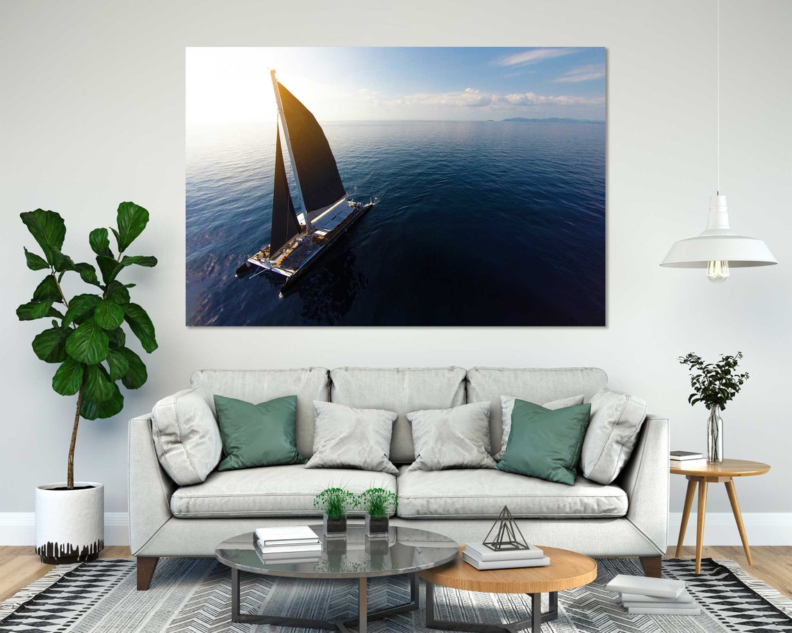 Sailboat With Black Sails Aerial View Calm Blue Ocean Sunset Poster