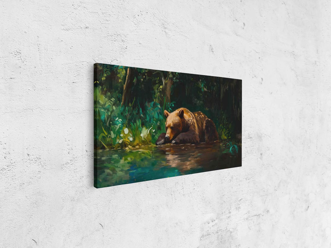 Grizzly Bear Resting Riverbank Lush Greenery Serene Wildlife Poster - Image 4