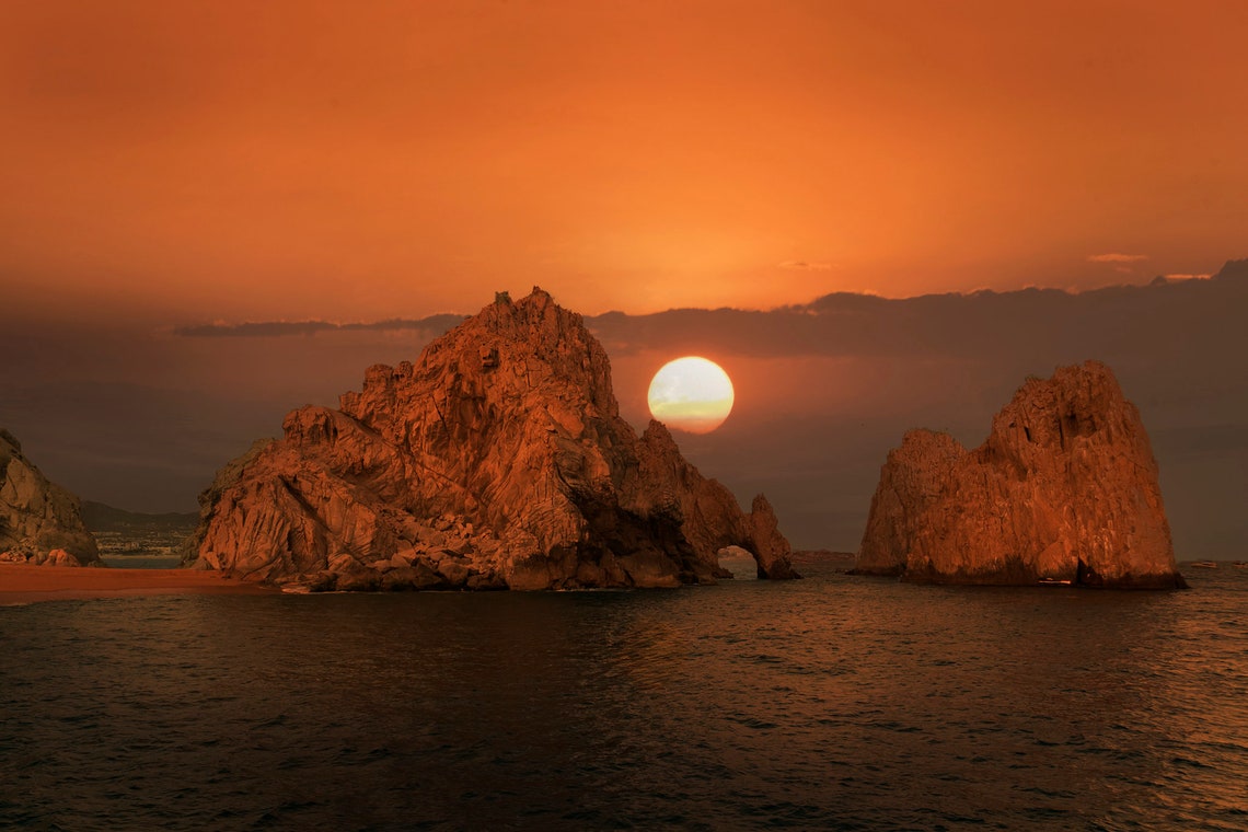 Cabo San Lucas El Arco Arch at Sunset with Blazing Orange Sun Poster