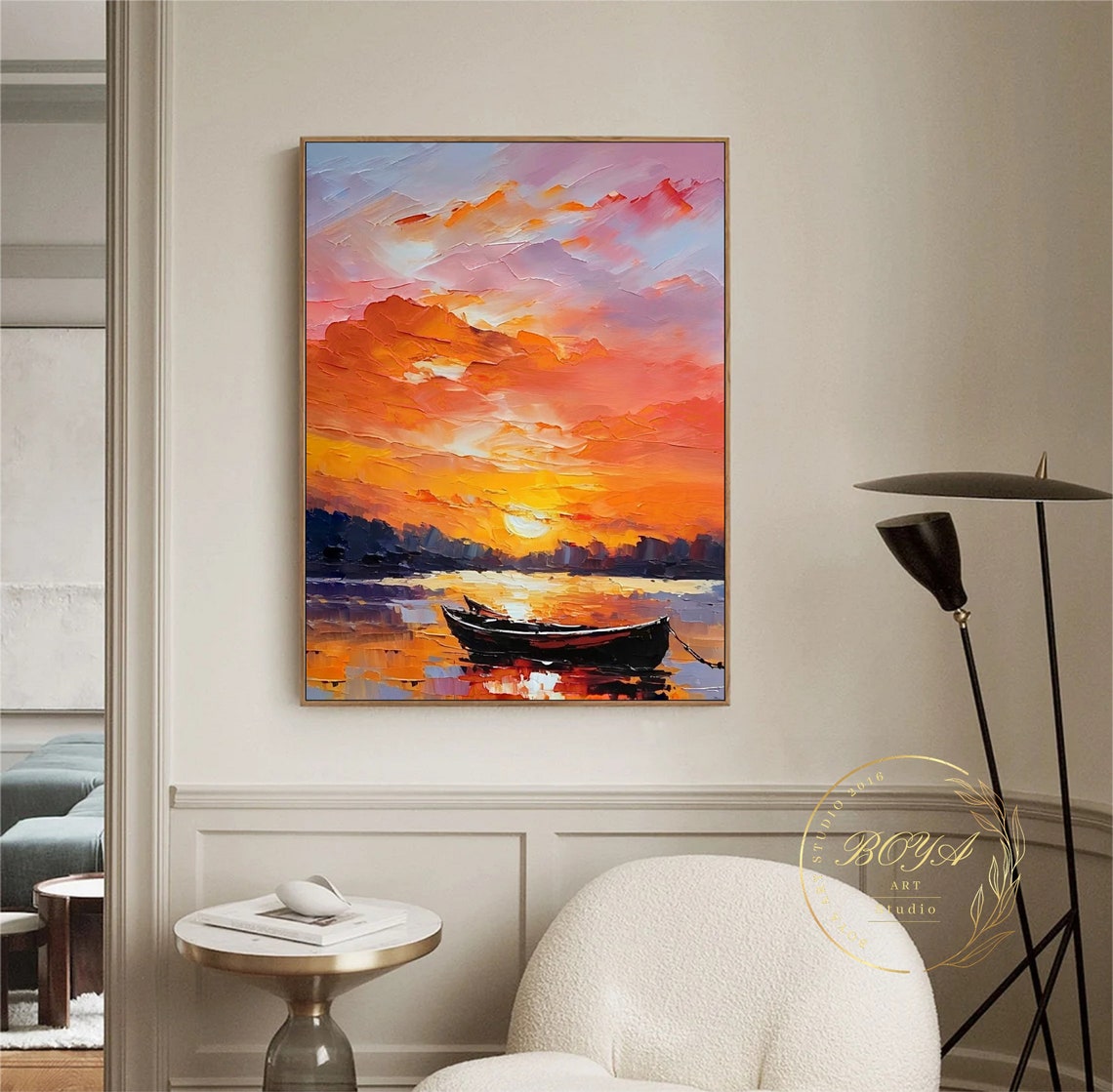 Vibrant Orange Sunset and Lone Boat Over Golden Water Poster - Image 3