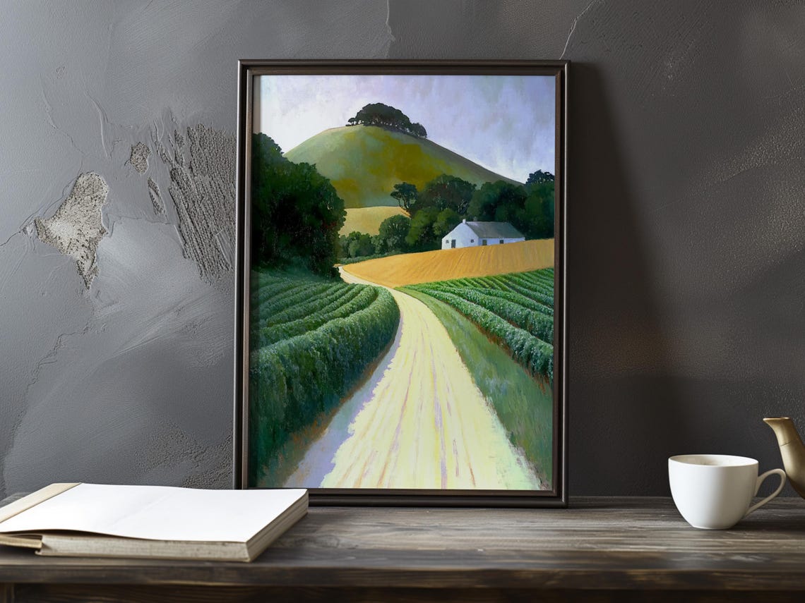 Sandy Road Through Lush Green Fields to a White Cottage Poster