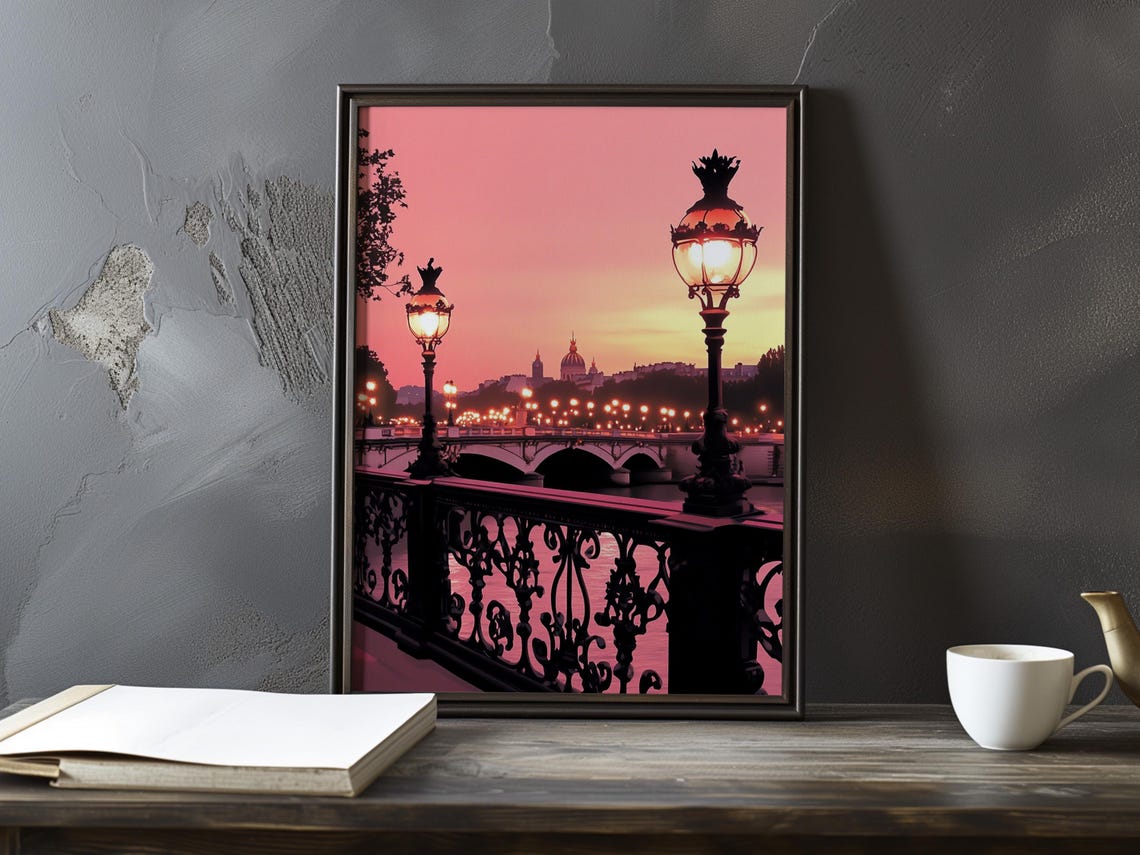 Pink Dawn Over a Seine Bridge With Glowing Vintage Lampposts Poster