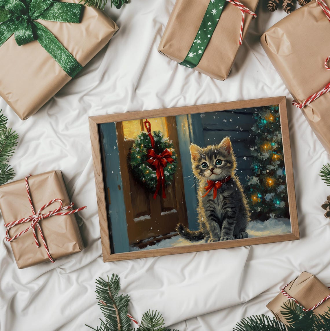 Tabby Kitten With a Red Bow on a Snowy Christmas Doorstep Poster - Image 2