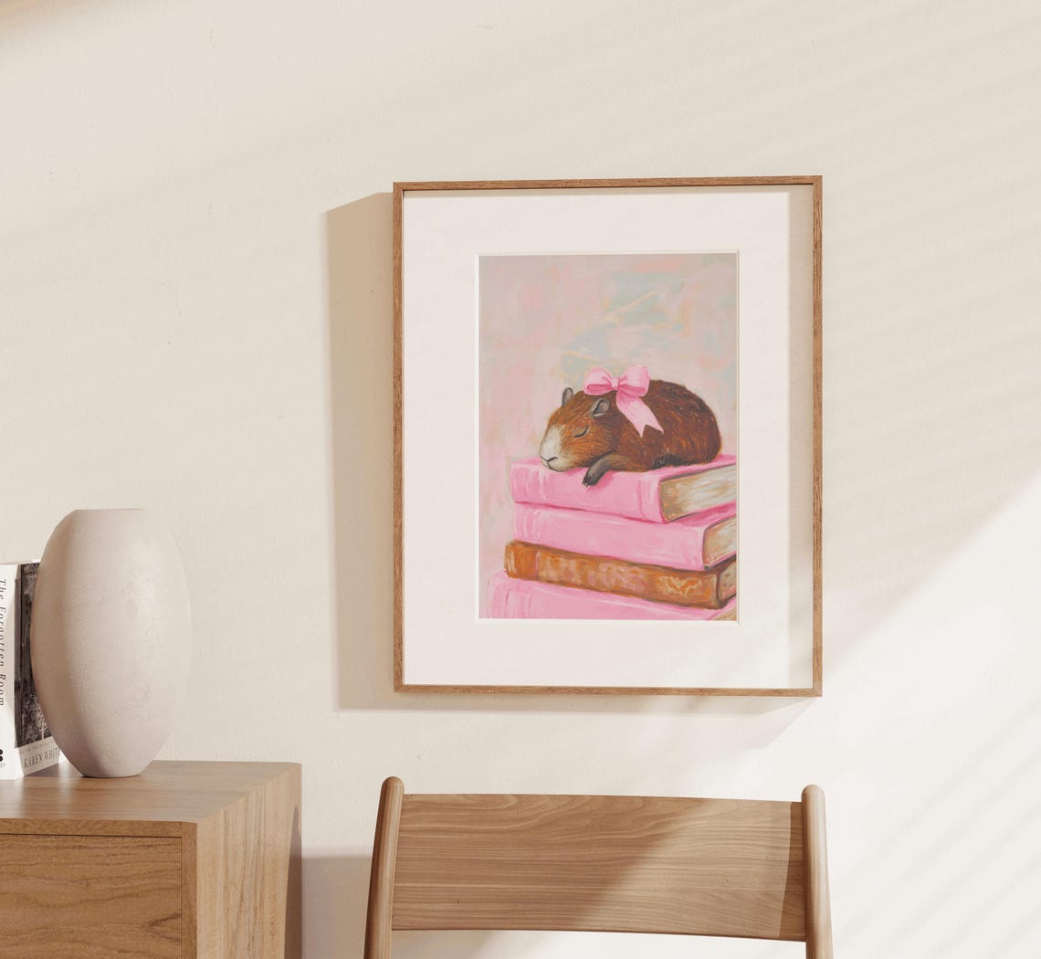 Sweet Sleepy Capybara Pink Book Stack Bow Nursery Reading Poster