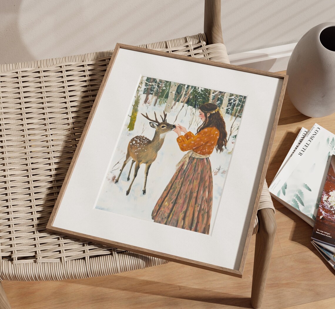Woman In Orange Dress Feeding Spotted Deer Snowy Forest Poster