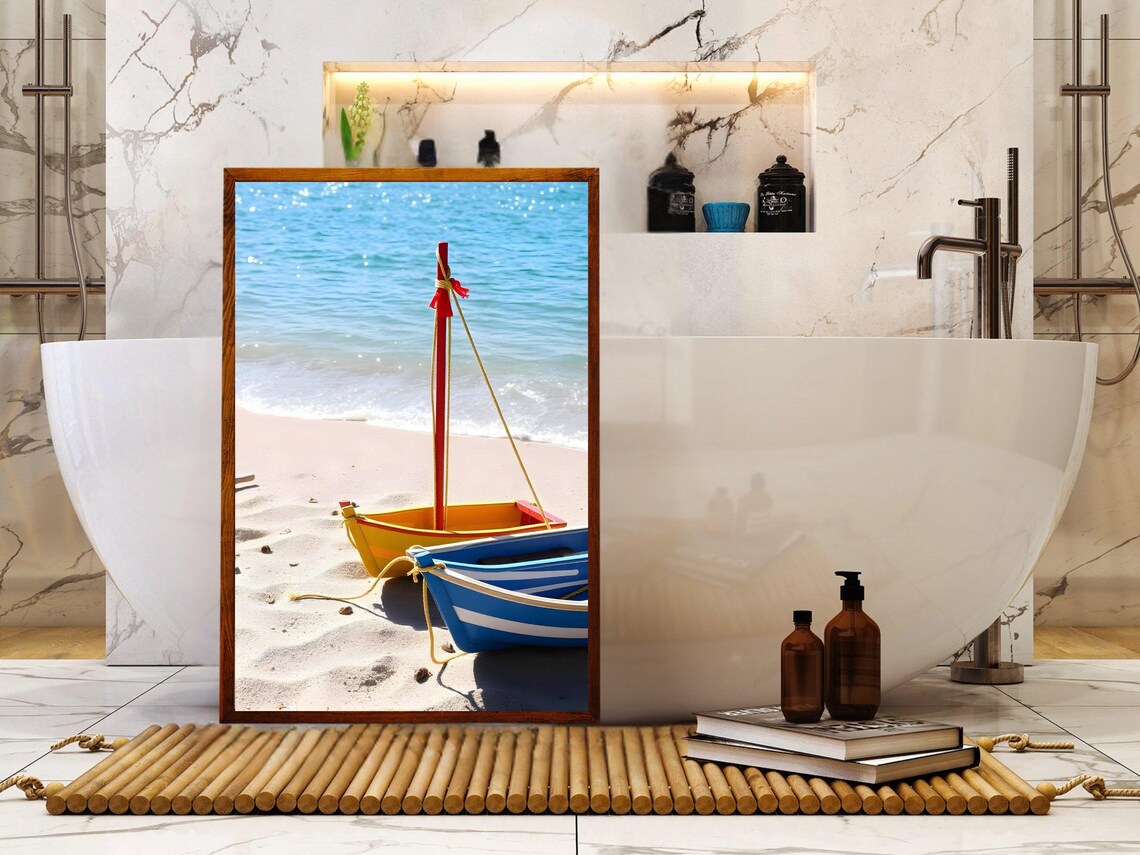 Two Colorful Wooden Boats Resting on Sunny Beach Shore Poster - Image 2
