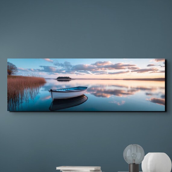 Wooden Rowboat Floating on a Glassy Sunset Lake in Panoramic View Poster