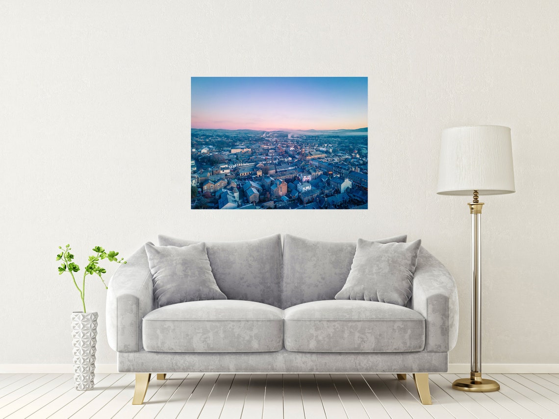 Aerial View of a Historic Old Town and Its Rooftops at Dawn Poster - Image 2
