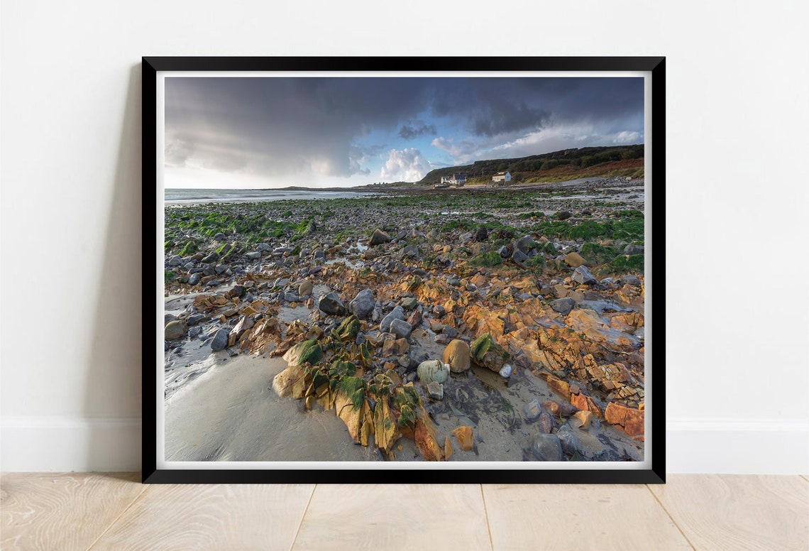 Port Eynon Beach Wales Rocky Shore Colorful Stones Dramatic Sky Poster