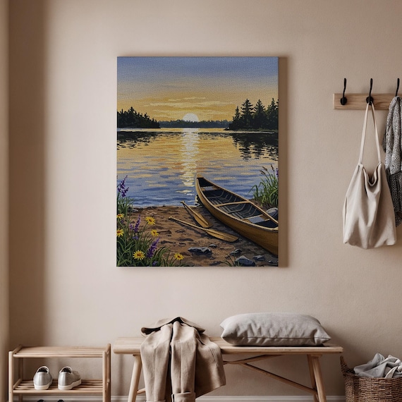 Serene Lake Sunset with Wooden Canoe on Shore Nature Landscape Print