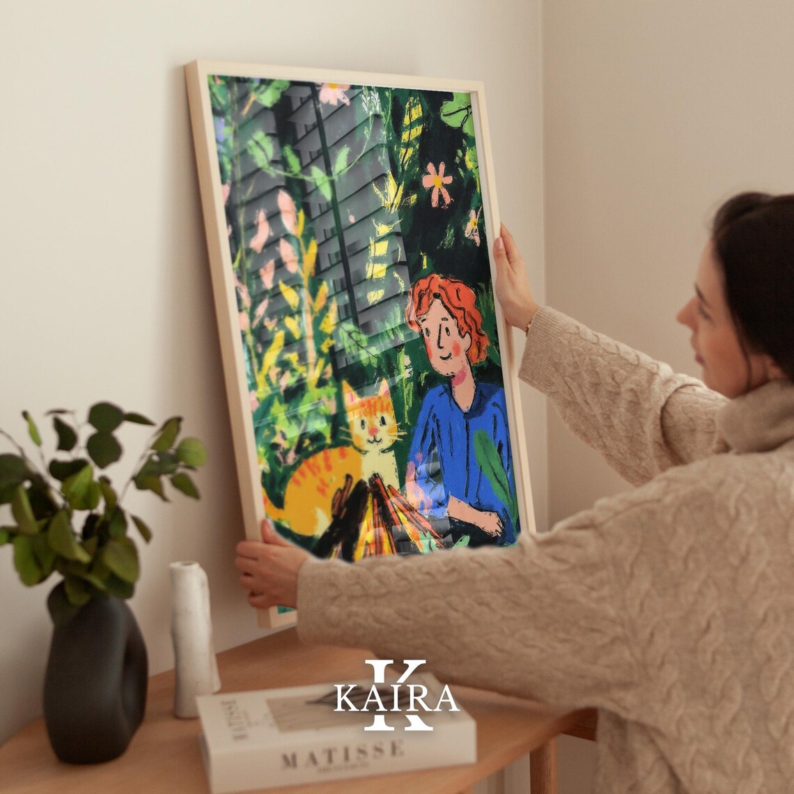 Red-Haired Boy Cuddling an Orange Cat by a Campfire in the Forest Poster - Image 2