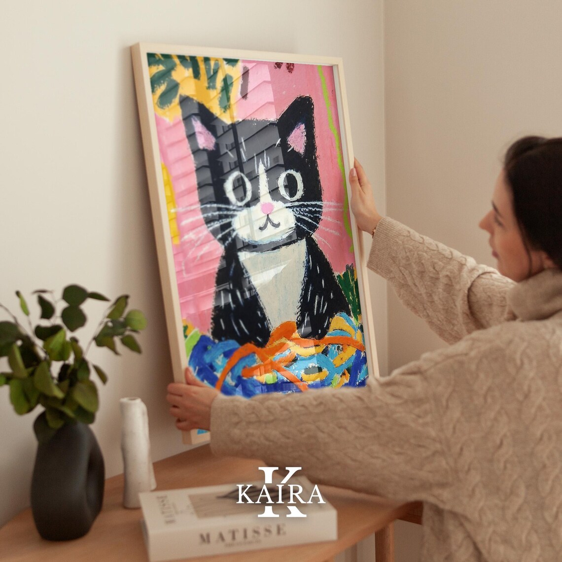 Playful Tuxedo Kitten With a Big Pile of Colorful Yarn Balls Poster - Image 2