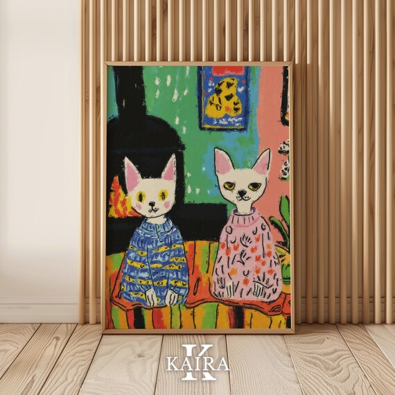Two Cats Wearing Cozy Patterned Sweaters by a Warm Fireplace Poster