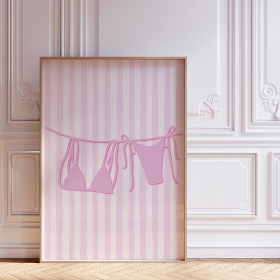Pink Bikini Hanging on Clothesline Poster With Pink Striped Background