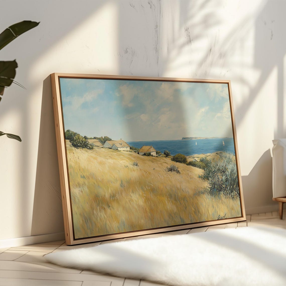 Sunlit Coastal Cottages With Sailboats on a Bright Ocean View Poster