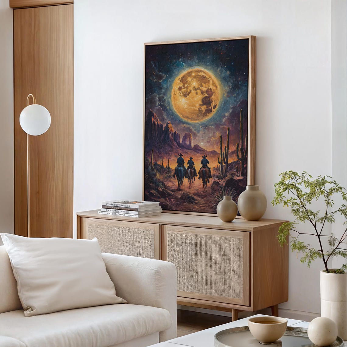 Three Cowboys Riding Toward A Giant Moon Over Desert Mesas Poster - Image 2
