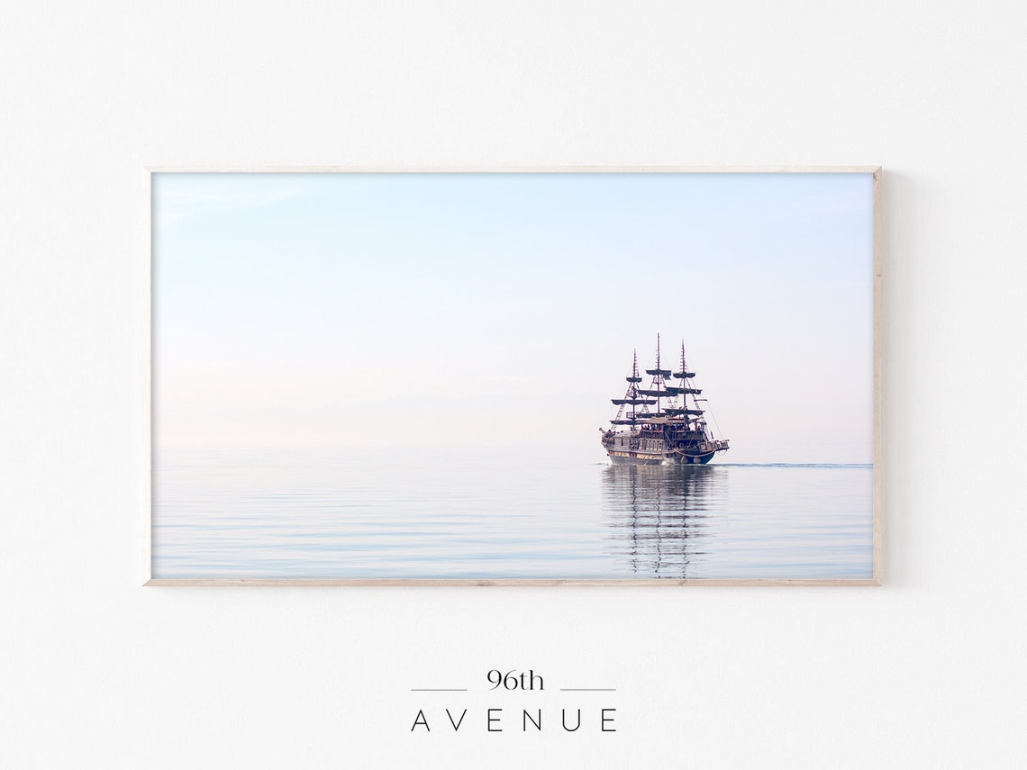 Tall Three-Masted Ship Sailing on Calm Pastel Sea Photo Poster