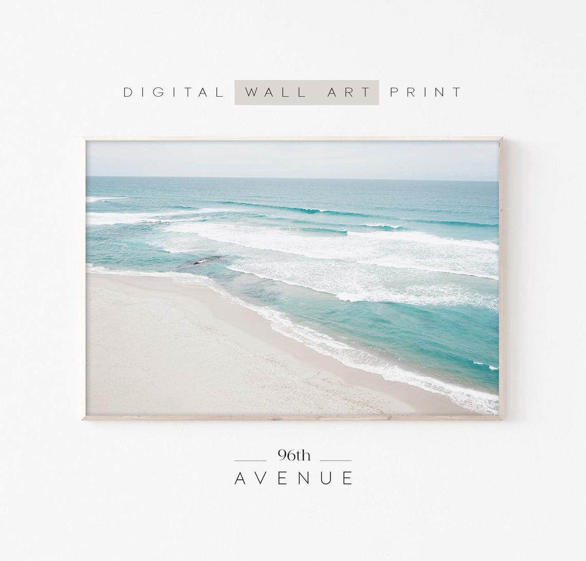 Aerial Turquoise Ocean Waves Washing Over White Sandy Shore Poster