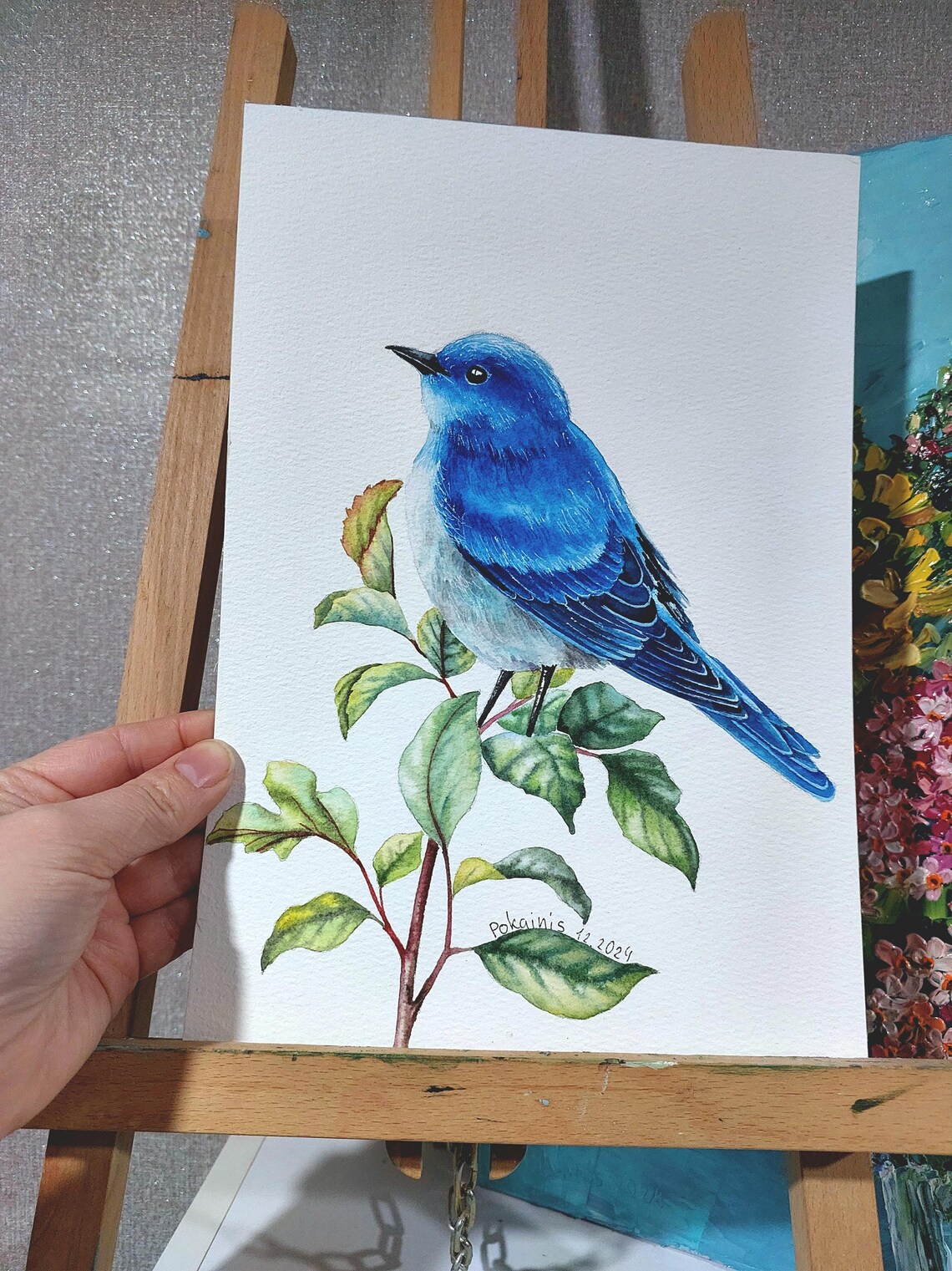 Vivid Blue Songbird Perched on Leafy Branch Watercolor Poster - Image 2