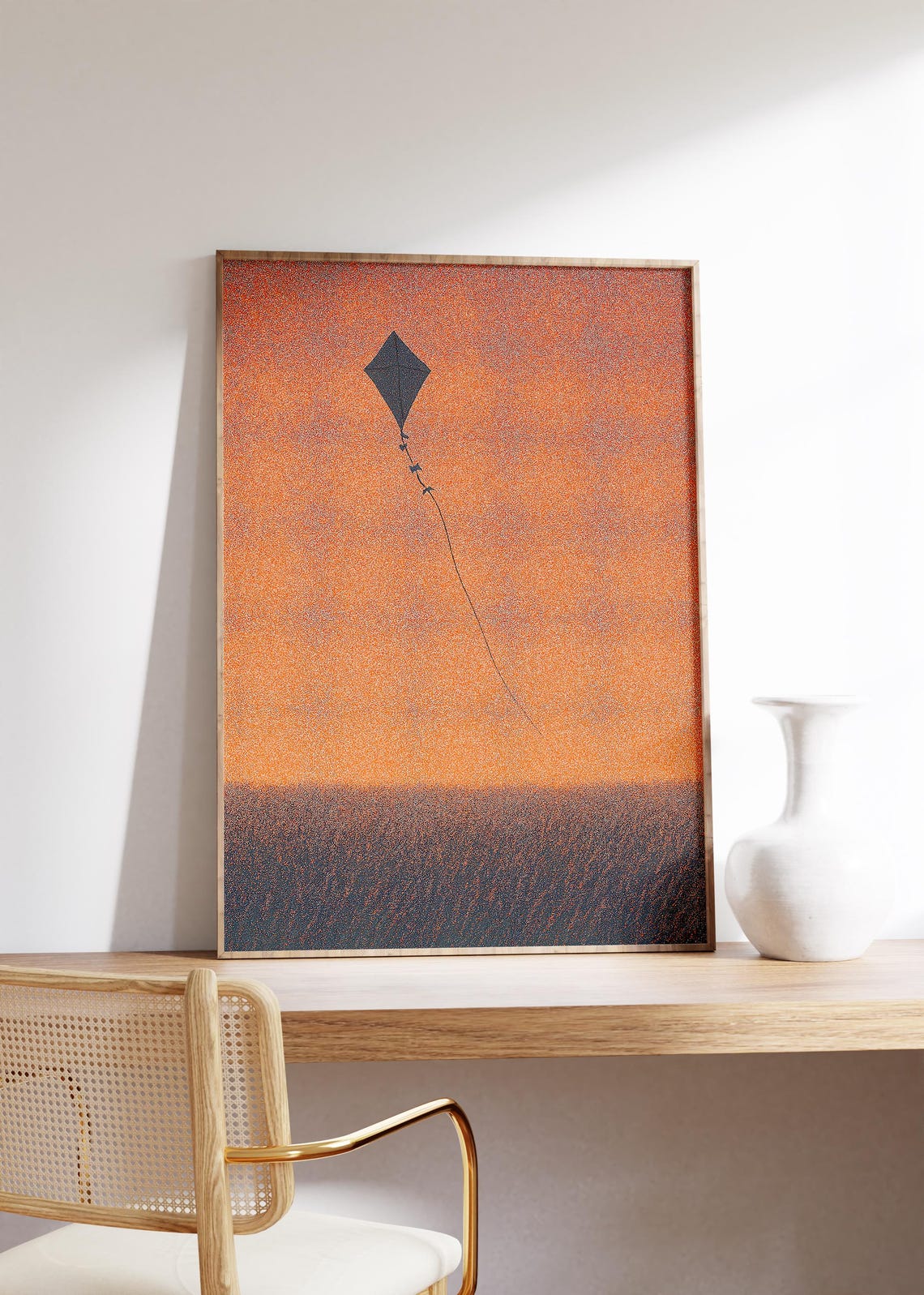 Lone Kite Flying over Dark Field at Glowing Orange Sunset Poster