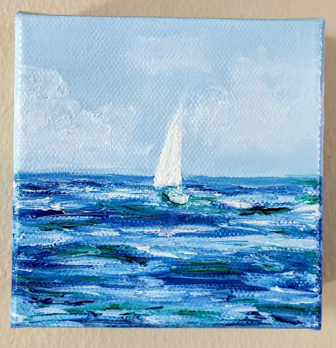 Lone Sailboat On Calm Blue Sea Under Soft Pale Sky Nautical Art Poster - Image 3