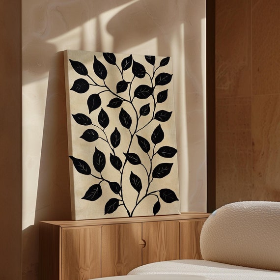 Minimalist Black Leaf Branch Artwork With Bold Contrast And Elegant Lines On A Neutral Textured Background For Modern Interiors