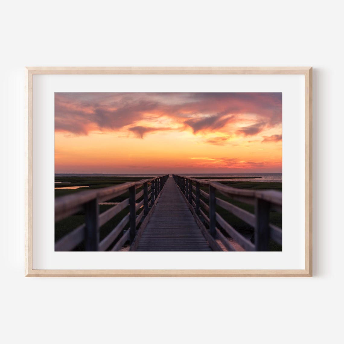 Wooden Boardwalk to the Beach Under a Fiery Sunset Sky Poster