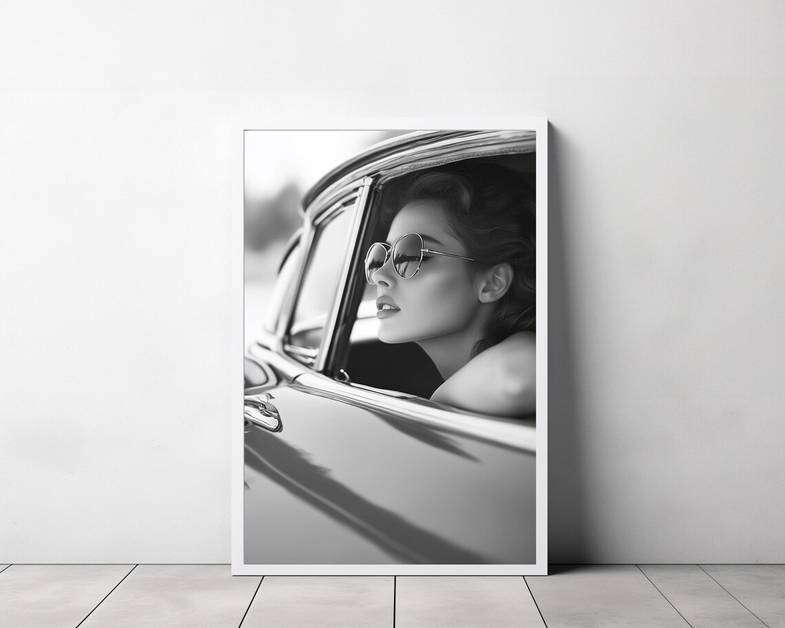 Vintage Woman in Sunglasses Leaning From a Classic Car Poster - Image 3