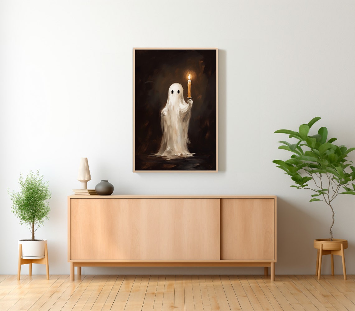 Small Ghost Holding a Lit Candle Alone in a Dark Room Poster - Image 2