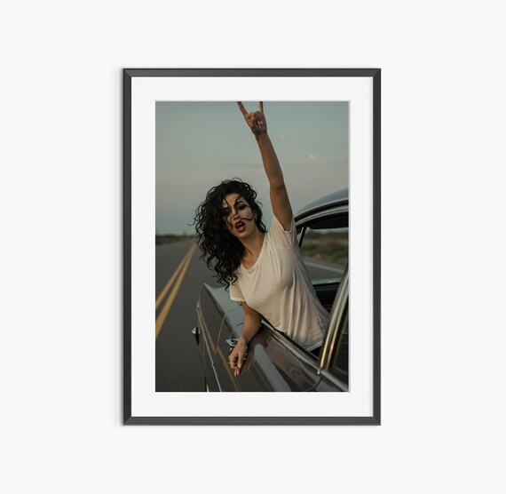 Rock On Hand Gesture Woman Leaning From Vintage Car Road Trip Poster